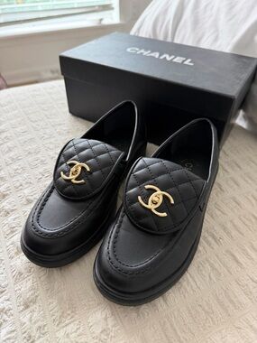 CHANEL Black Quilted Leather Loafers with Gold CC Emblem